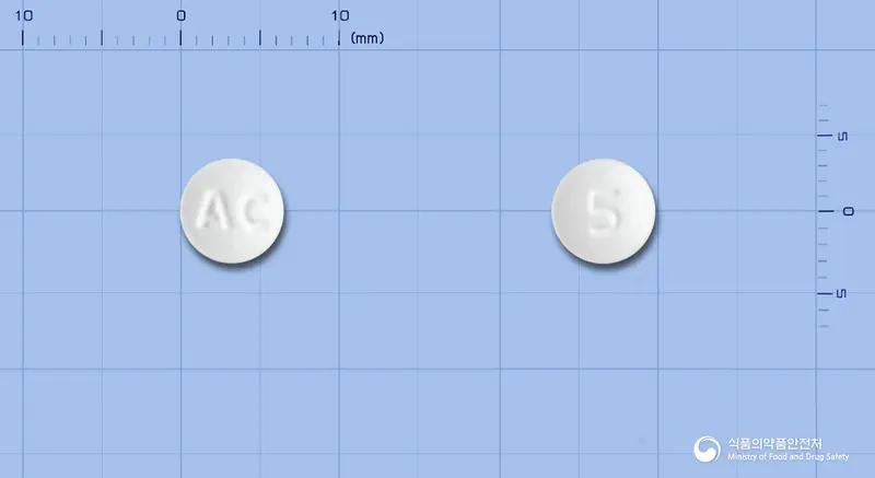 리마덱스정(리마프로스트알파덱스) 앞뒤 사진 (흰색 원형, 각인 AC / 5)
