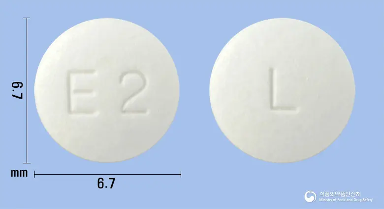 리프스톤정(리마프로스트알파덱스) 앞뒤 사진 (흰색 원형, 각인 E2 / L)
