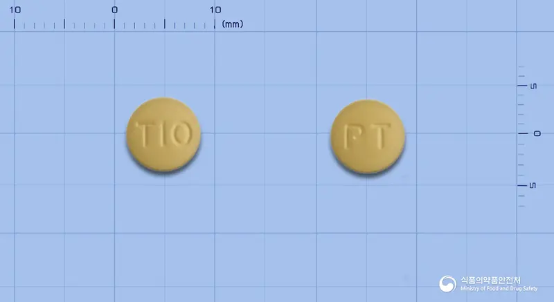 카마라필정10밀리그램(타다라필) 앞뒤 사진 (노란색 원형, 각인 T10 / PT)
