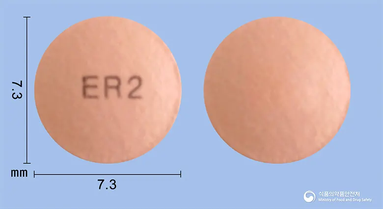 이마졸정20mg(에스오메프라졸마그네슘삼수화물) 앞뒤 사진 (분홍색 원형, 각인 ER 2)