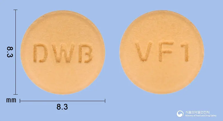 브이포지정5/80밀리그램(암로디핀베실산염,발사르탄) 앞뒤 사진 (주황색 원형, 각인 DWB / VF1)