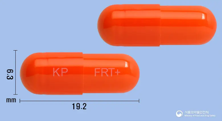 프레토플러스캡슐 앞뒤 사진 (주황색 캡슐, 각인 KP FRT+)