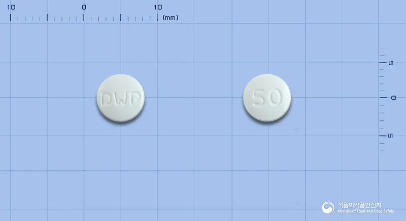 카덱스정(비칼루타미드) 앞뒤 사진 (흰색 원형, 각인 DWP / 50)