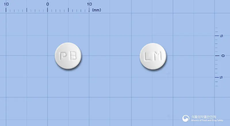 리마팜정(리마프로스트알파덱스) 앞뒤 사진 (흰색 원형, 각인 PB / LM)