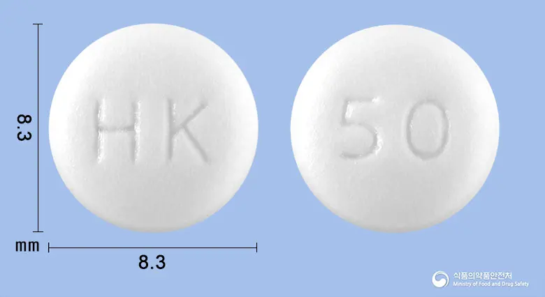 카리노젠정50단위(칼리디노게나제) 앞뒤 사진 (흰색 원형, 각인 HK / 50)