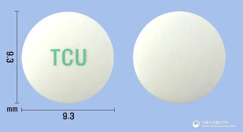유린스타서방정(탐스로신염산염) 앞뒤 사진 (흰색 원형, 각인 TCU)