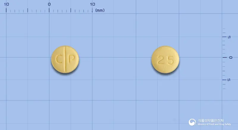 토라펜정(토피라메이트) 앞뒤 사진 (노란색 원형, 각인 C P / 25)