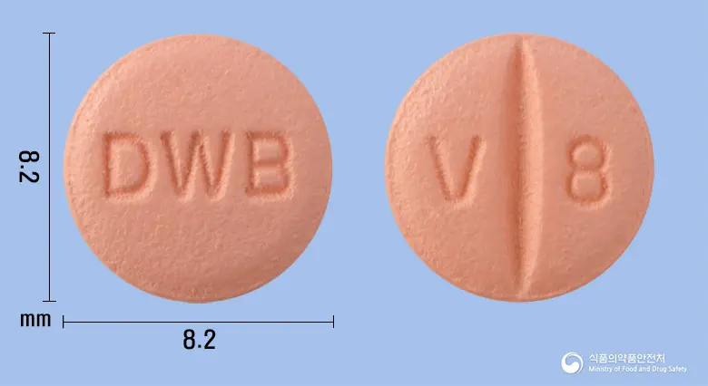 디오브이정80mg(발사르탄) 앞뒤 사진 (분홍색 원형, 각인 DWB / V 8)