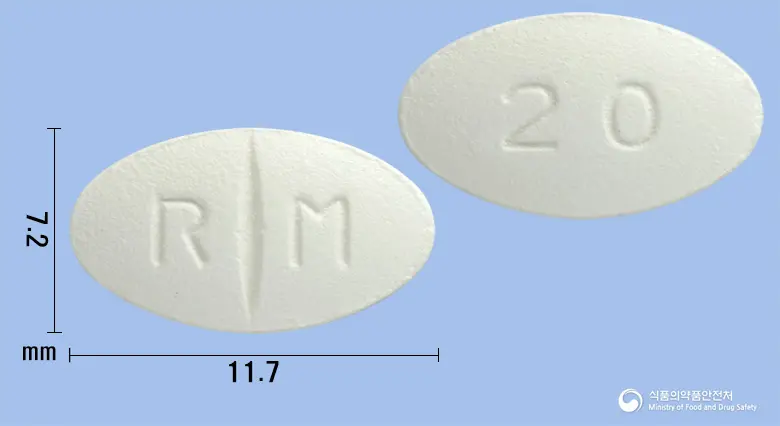 렉사멜정20mg(에스시탈로프람옥살산염) 앞뒤 사진 (흰색 타원형, 각인 R M / 20)