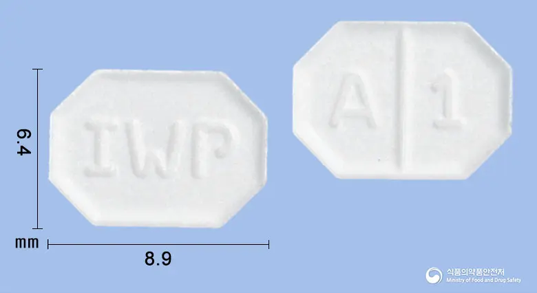 암롤정(암로디핀베실산염) 앞뒤 사진 (흰색 팔각형, 각인 IWP / A 1)