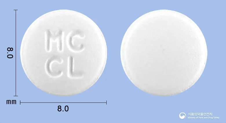 무코씨엘정(레바미피드) 앞뒤 사진 (흰색 원형, 각인 MCCL)