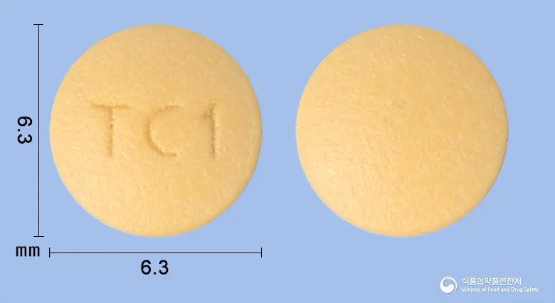 라프라졸정10mg(라베프라졸나트륨) 앞뒤 사진 (주황색 원형, 각인 TC1)