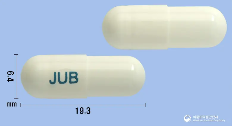 유비진캡슐 앞뒤 사진 (흰색 캡슐, 각인 JUB)