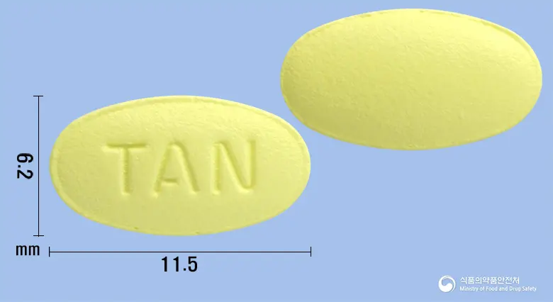 휴사탄정 앞뒤 사진 (연두색 타원형, 각인 TAN)