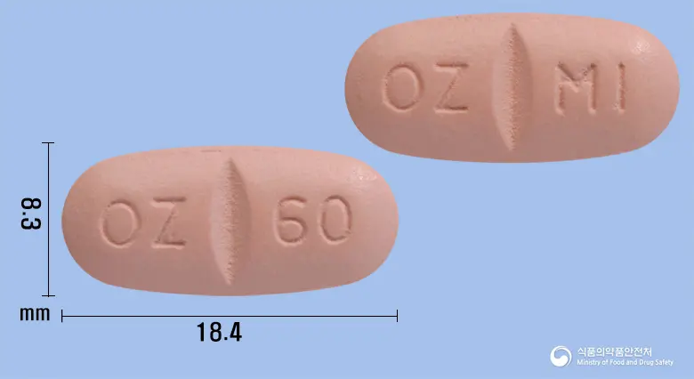 옥사제핀정600밀리그램(옥스카르바제핀) 앞뒤 사진 (분홍색 타원형, 각인 OZ 60 / OZ MI)