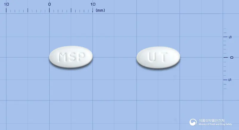 가스티인씨알정(모사프리드시트르산염수화물) 앞뒤 사진 (흰색 타원형, 각인 MSP / UT)
