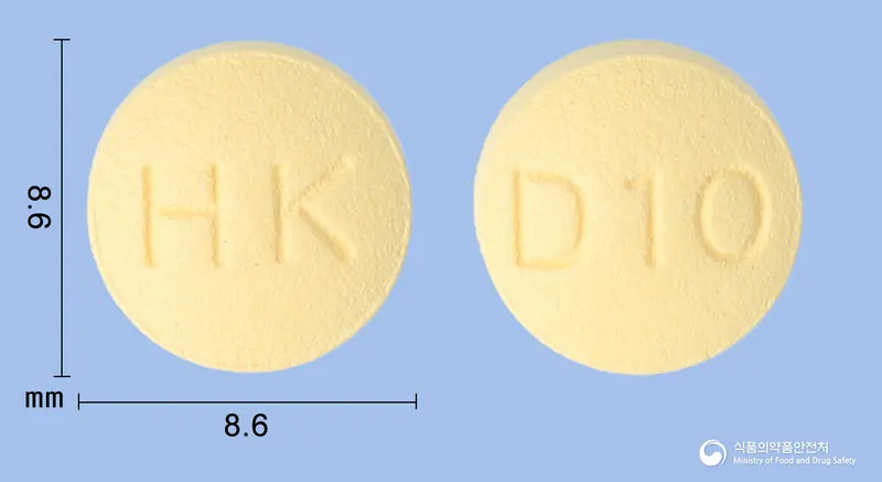 네오페질정10밀리그램(도네페질염산염수화물) 앞뒤 사진 (주황색 원형, 각인 HK / D10)