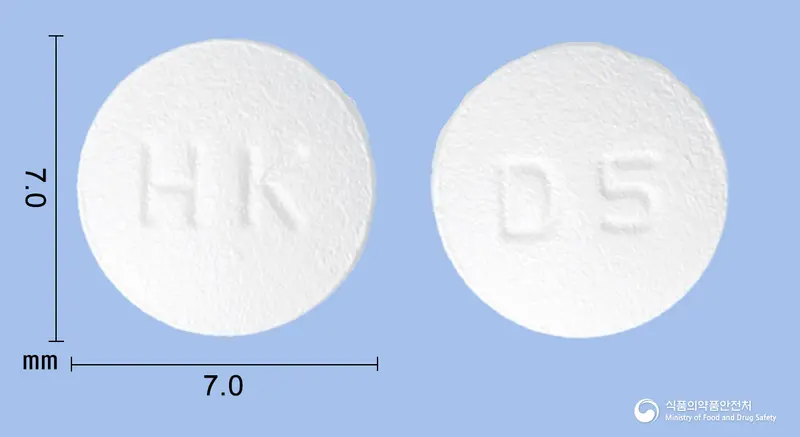 네오페질정5밀리그램(도네페질염산염수화물) 앞뒤 사진 (흰색 원형, 각인 HK / D5)