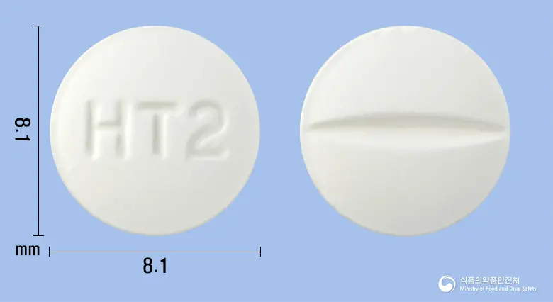 미니모프레신정0.2mg(데스모프레신아세트산염) 앞뒤 사진 (흰색 원형, 각인 HT2)