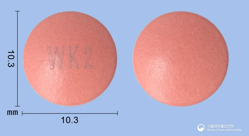 이소졸정40mg(에스오메프라졸마그네슘삼수화물) 앞뒤 사진 (분홍색 원형, 각인 WK2)
