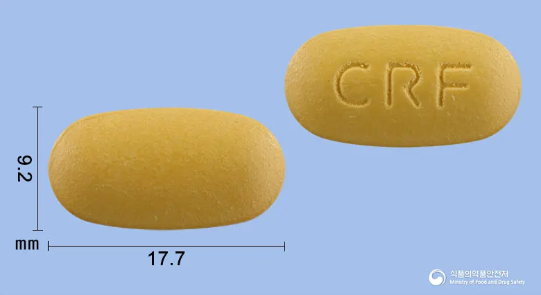 세레포린정(콜린알포세레이트) 앞뒤 사진 (주황색 타원형, 각인 CRF)