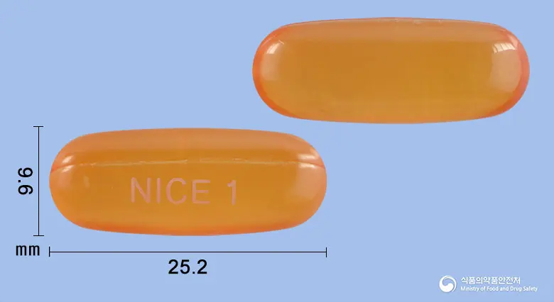 나이스콜드연질캡슐 앞뒤 사진 (주황색·투명 캡슐, 각인 NICE 1)