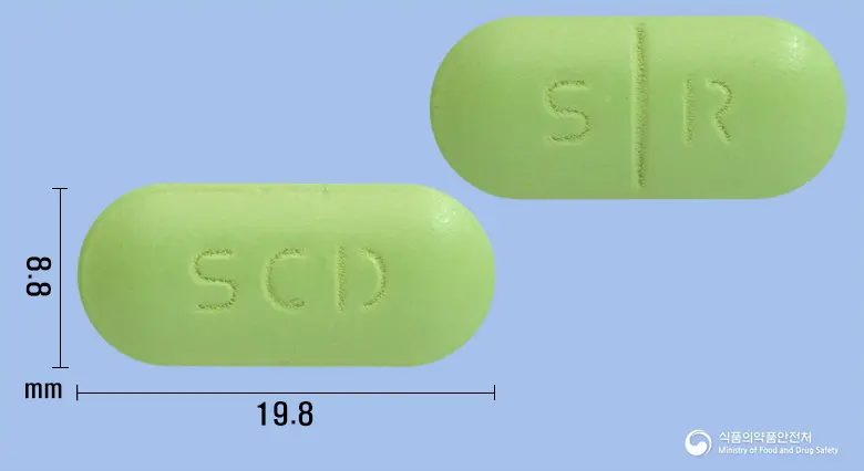 에스알비디정 앞뒤 사진 (연두색 장방형, 각인 SCD / S R)