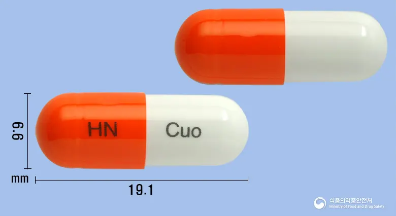 클로베인듀오캡슐 앞뒤 사진 (주황색 캡슐, 각인 HN Cuo)