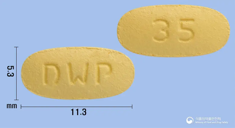 리세원플러스정 앞뒤 사진 (주황색 타원형, 각인 DWP / 35)