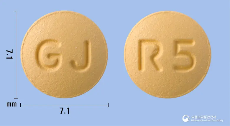 유니로바정5mg(로수바스타틴칼슘) 앞뒤 사진 (주황색 원형, 각인 R5)