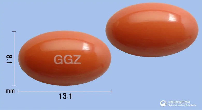 기가제로연질캡슐 앞뒤 사진 (주황색 캡슐, 각인 GGZ)