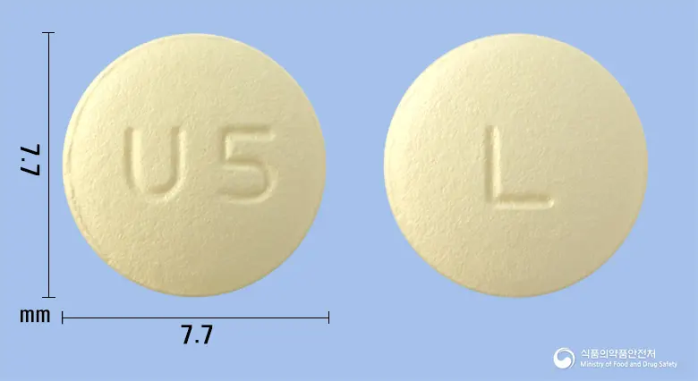 베시캄정5밀리그램(솔리페나신숙신산염) 앞뒤 사진 (노란색 원형, 각인 U5 / L)