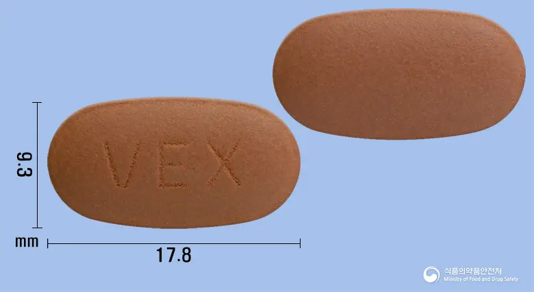 바이타액트이엑스정 앞뒤 사진 (갈색 타원형, 각인 VEX)