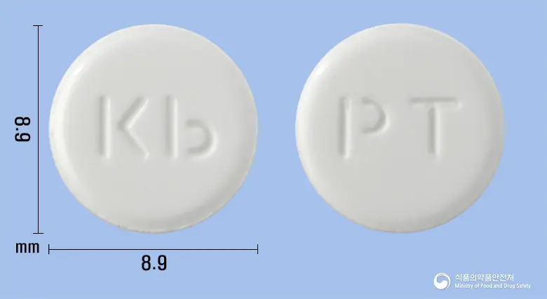 프로부틴정(트리메부틴말레산염) 앞뒤 사진 (흰색 원형, 각인 Kb / PT)
