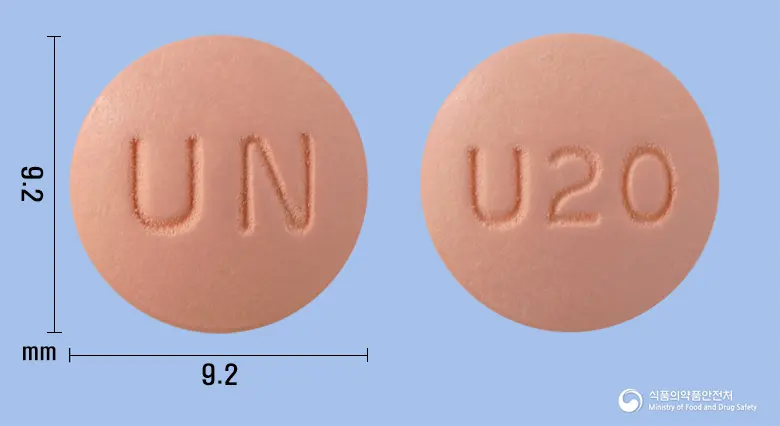 로수타틴정20mg(로수바스타틴칼슘)(수출용) 앞뒤 사진 (분홍색 원형, 각인 UN / U20)