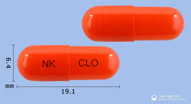 클로렌캡슐 앞뒤 사진 (주황색 캡슐, 각인 NK CLO)