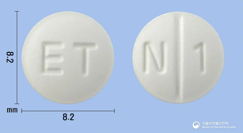 메네신정16밀리그램(베타히스틴염산염) 앞뒤 사진 (흰색 원형, 각인 ET / N 1)