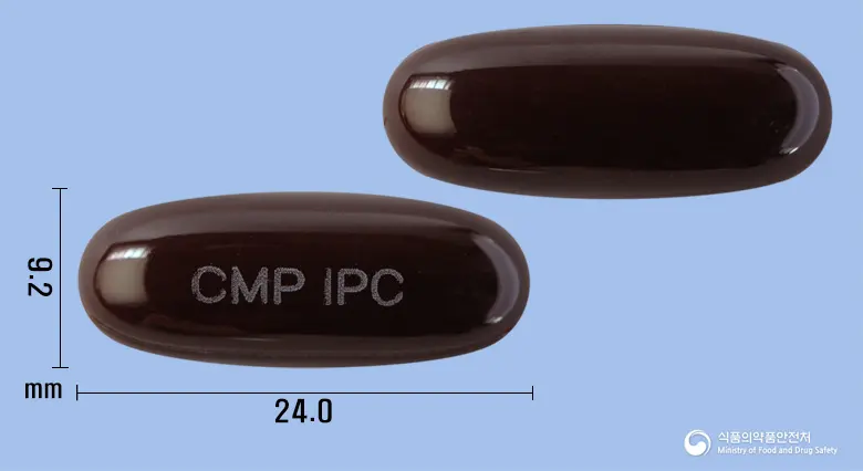 임팩셀연질캡슐 앞뒤 사진 (갈색 캡슐, 각인 CMP IPC)