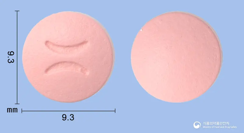 부로멜장용정(브로멜라인) 앞뒤 사진 (분홍색 원형)