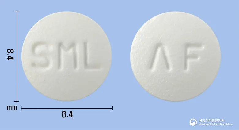 아세펜정(아세클로페낙) 앞뒤 사진 (흰색 원형, 각인 SML / ΛF)