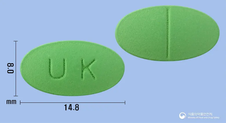 진코넥신정 앞뒤 사진 (연두색 타원형, 각인 UK)
