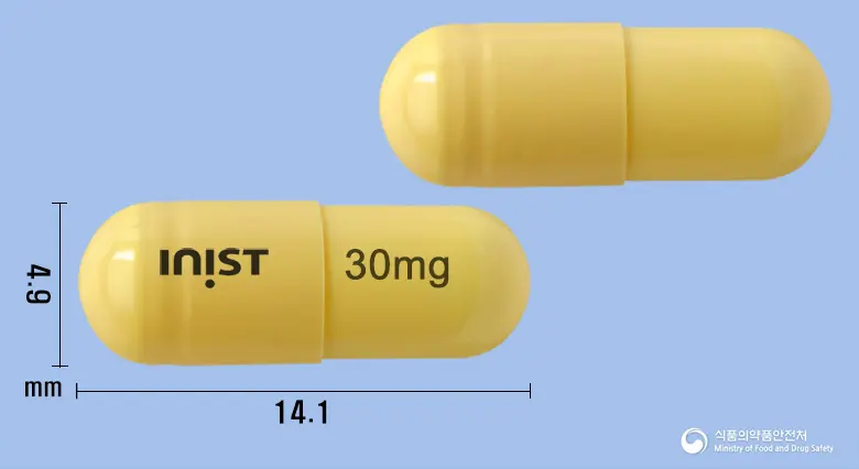 셀타플루캡슐30mg(오셀타미비르인산염) 앞뒤 사진 (노란색 캡슐, 각인 30mg)