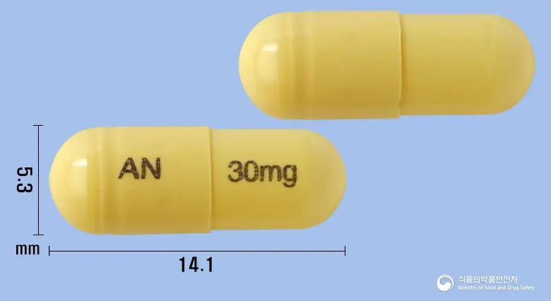 애니플루캡슐30밀리그램(오셀타미비르인산염) 앞뒤 사진 (노란색 캡슐, 각인 AN 30mg)