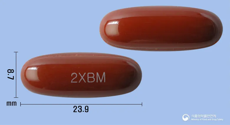 투엑스비엠연질캡슐 앞뒤 사진 (갈색 캡슐, 각인 2XBM)