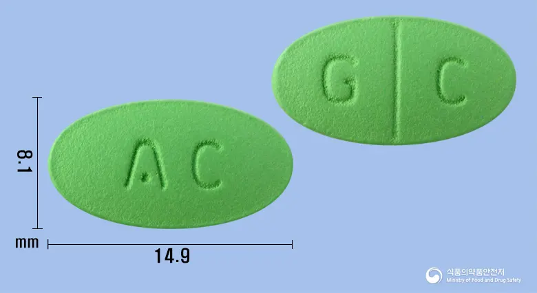 아넥신정 앞뒤 사진 (연두색 타원형, 각인 AC / G C)