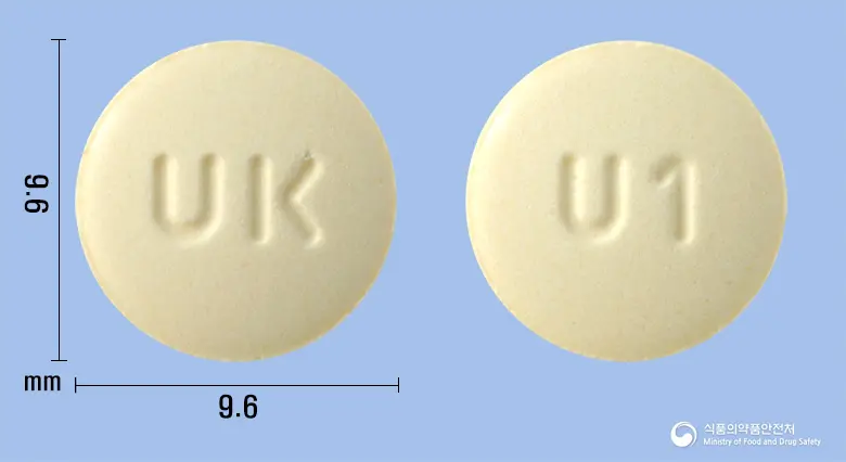 유니바스정75mg(나프토피딜) 앞뒤 사진 (노란색 원형, 각인 UK / U1)