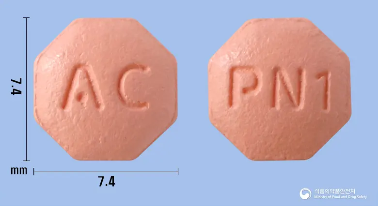 피나스로정1mg(피나스테리드) 앞뒤 사진 (분홍색 팔각형, 각인 AC / PN1)