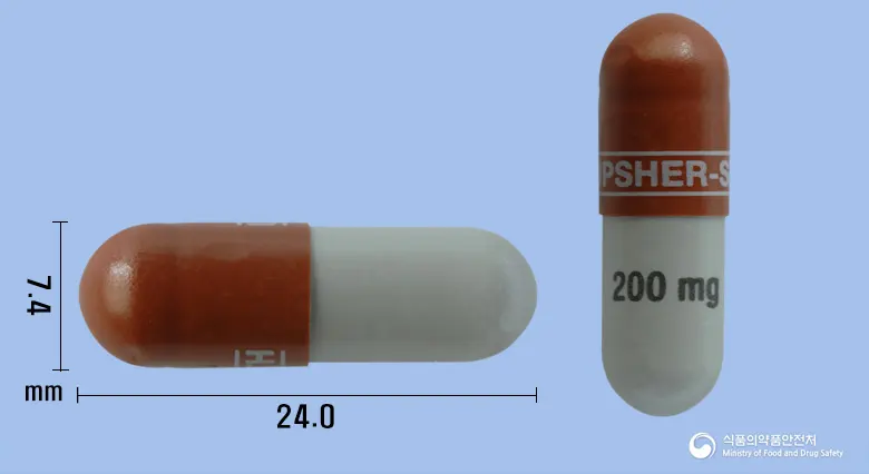 큐덱시서방캡슐200밀리그램(토피라메이트) 앞뒤 사진 (갈색 캡슐, 각인 ------------UPSHER-SMITH------------ 200mg)