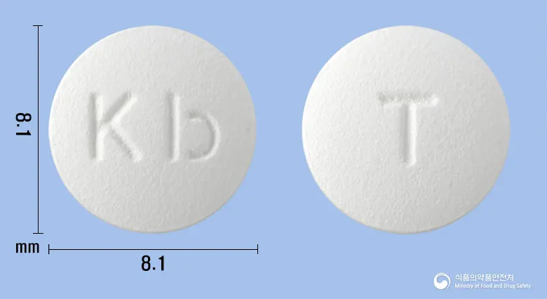티로칸정(티로프라미드염산염) 앞뒤 사진 (흰색 원형, 각인 Kb / T)