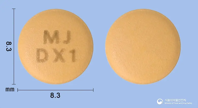 듀얼엑스정5/80mg 앞뒤 사진 (주황색 원형, 각인 MJDX1)